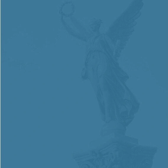 A winged statue holding a wreath stands atop a pedestal, viewed from below, with a blue color overlay.